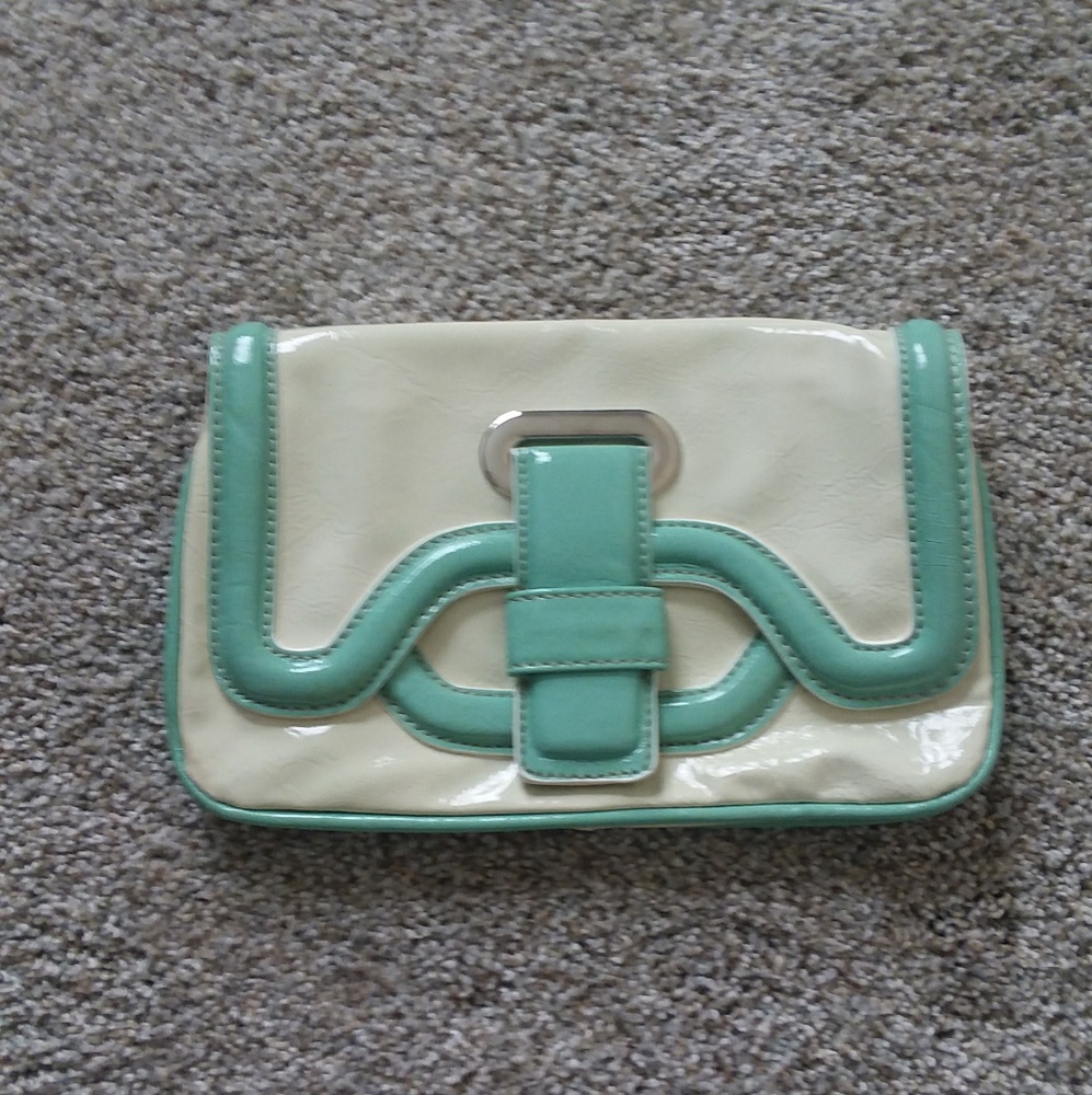*FREE with purchase*  Stylish clutch